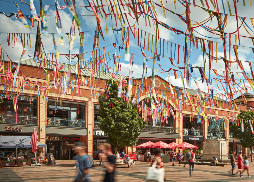 Image of Broadgate area of Coventry city centre - people and restaurants
